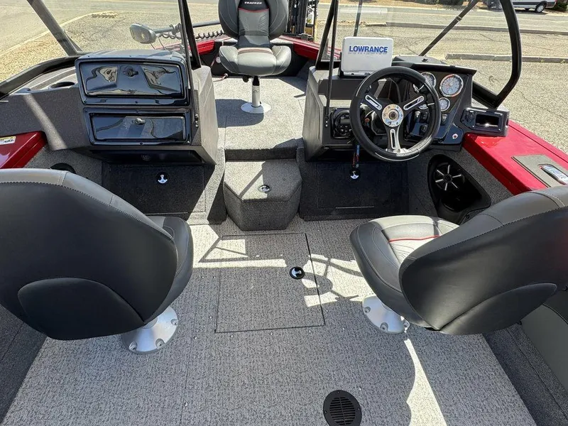 Slide: The Image of 2024 Tracker Targa™ V-18 Combo boat interior with steering wheel and seating. - 33