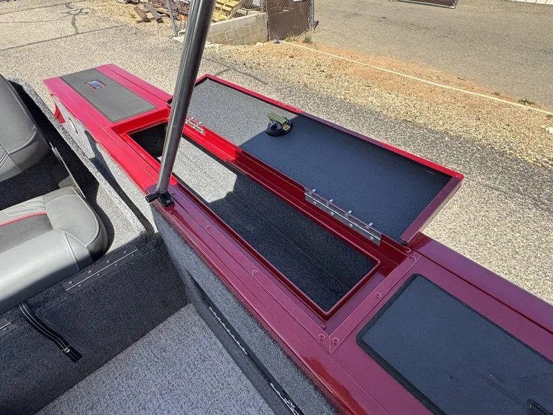 Slide: The Image of 2024 Tracker Targa™ V-18 Combo boat interior with open storage compartments. - 35