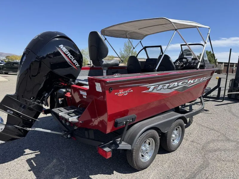 Slide: The Image of 2024 Tracker Targa™ V-18 Combo boat with Mercury engine on a trailer. - 4