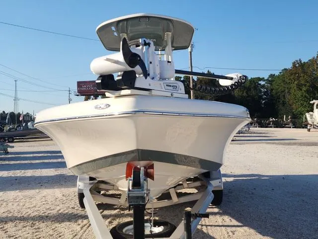 Slide: The Image of 2025 Skeeter SX2350 boat on trailer, front view, parked outdoors. - 2