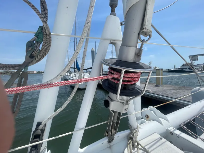 Slide: The Image of Seawind 1000 sailboat deck with rigging and marina view, 2001 model. - 13