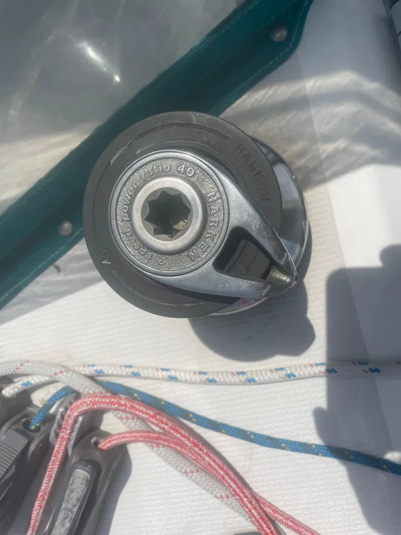 Slide: The Image of Close-up of a winch on a 2001 Seawind 1000 sailboat deck. - 23