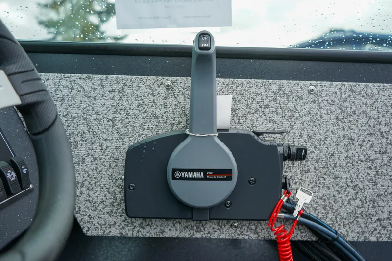 Slide: The Image of Throttle control of 2025 Alumaweld Stryker X202 boat with Yamaha branding. - 13