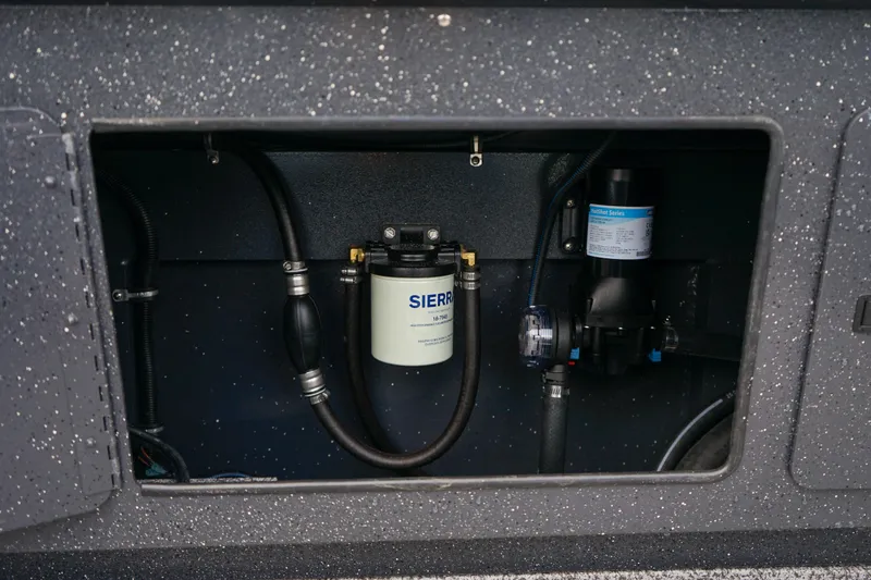 Slide: The Image of 2025 Alumaweld Stryker X202 boat compartment with Sierra filter and pump system. - 20
