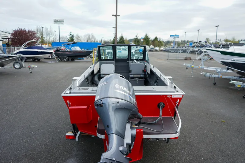 Slide: The Image of 2025 Alumaweld Stryker X202 boat with Yamaha motor in a dealership lot. - 7