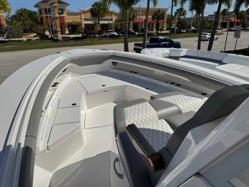 Slide: The Image of 2025 Regulator 37 boat interior with luxurious seating and sleek design. - 10