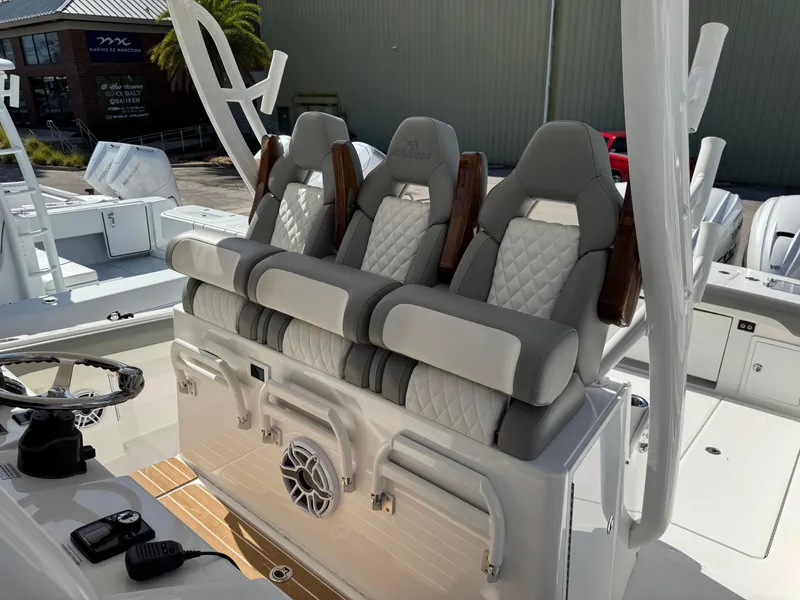 Slide: The Image of 2025 Regulator 37 boat with luxurious seating and modern design. - 9
