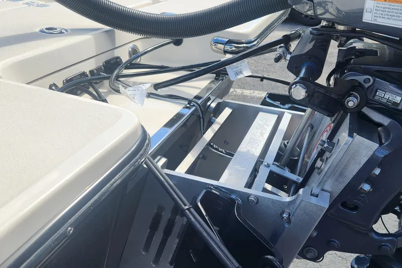 Slide: The Image of 2026 ShearWater X22 HYBRID boat engine compartment with visible mechanical components. - 5