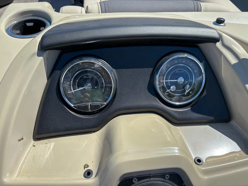 Slide: The Image of Dashboard of 2023 Barletta CABRIO 24 UC boat with dual gauges. - 13