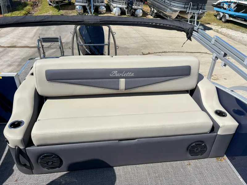 Slide: The Image of 2023 Barletta Cabrio 24 UC boat seat with cup holders and speakers. - 6
