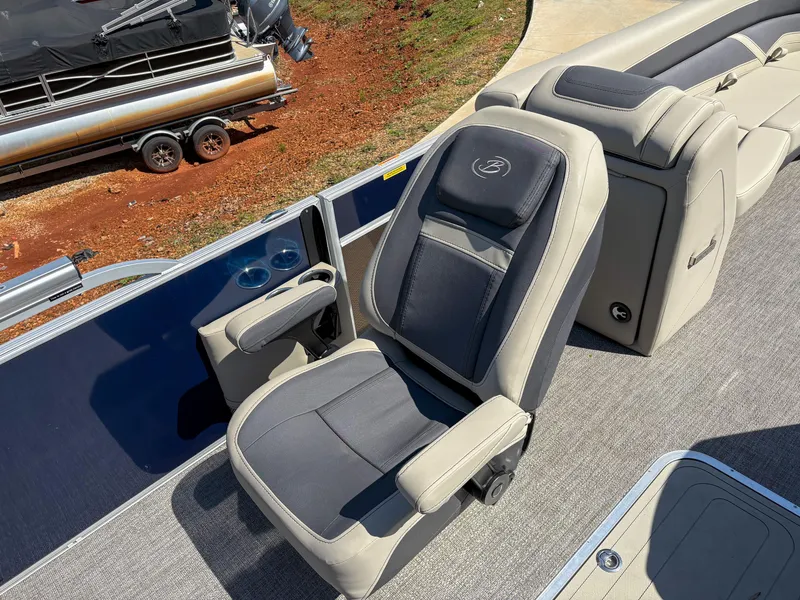 Slide: The Image of 2023 Barletta Cabrio 24 UC boat seat with armrests and cup holders. - 8