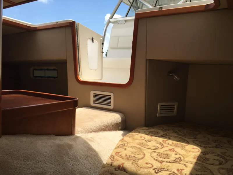 Slide: The Image of Interior cabin of 2008 Calcutta 390 boat with carpet and patterned upholstery. - 17