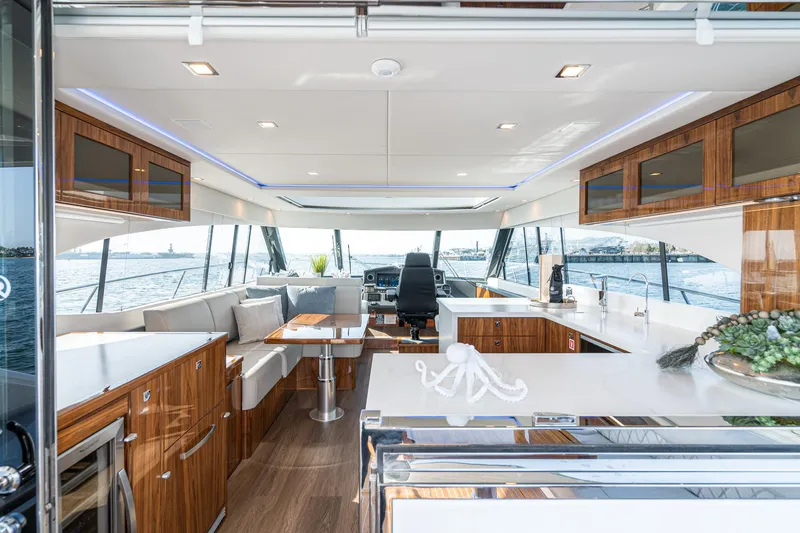 Slide: The Image of Luxurious interior of 2023 Riviera 5400 Sport Yacht with modern design and ocean view. - 25