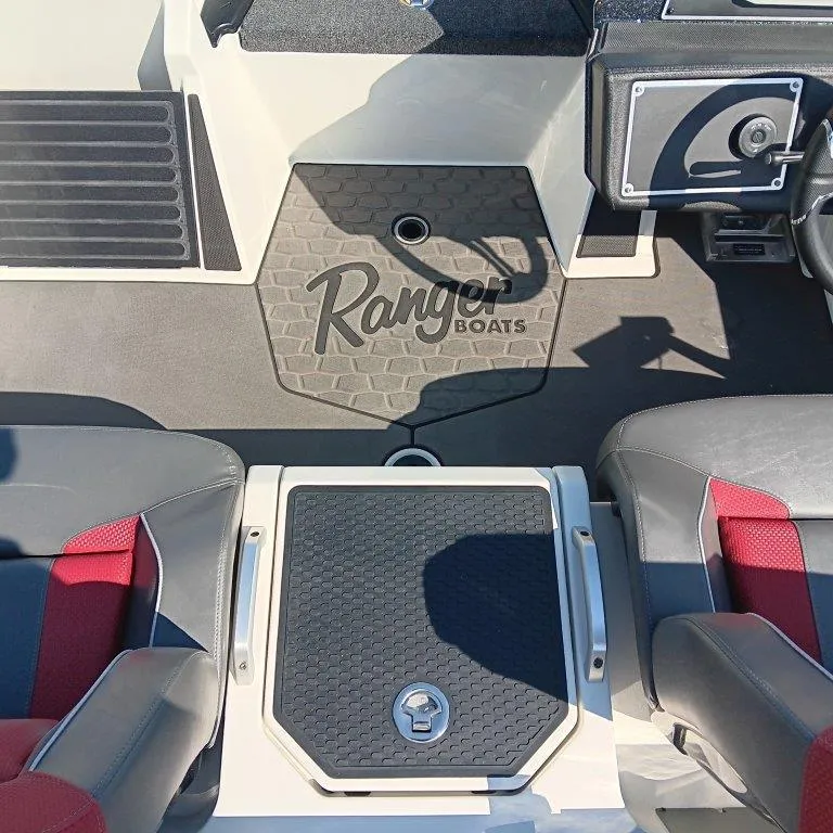 Slide: The Image of 2025 Ranger Z520 boat interior with logo, featuring sleek seating and modern design. - 10