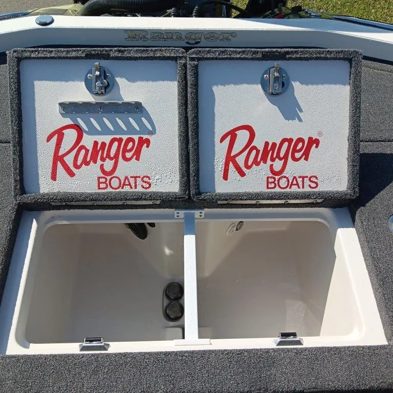 Slide: The Image of 2025 Ranger Z520 boat storage compartments with Ranger Boats logo. - 9