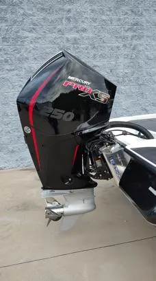 Slide: The Image of 2025 Caymas CX21 Pro boat with Mercury 250 Pro XS outboard motor. - 8