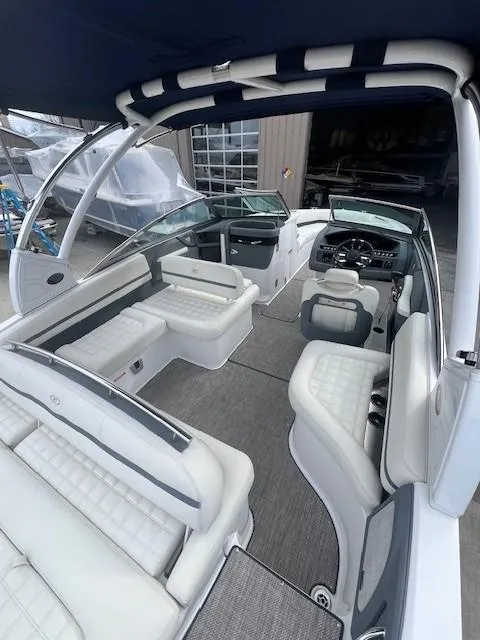 Slide: The Image of 2018 Cobalt R5 boat interior with luxurious seating and modern dashboard. - 16