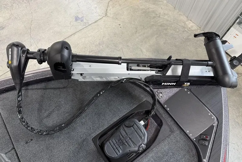 Slide: The Image of 2025 Skeeter ZX150 boat with Minn Kota trolling motor on deck. - 9