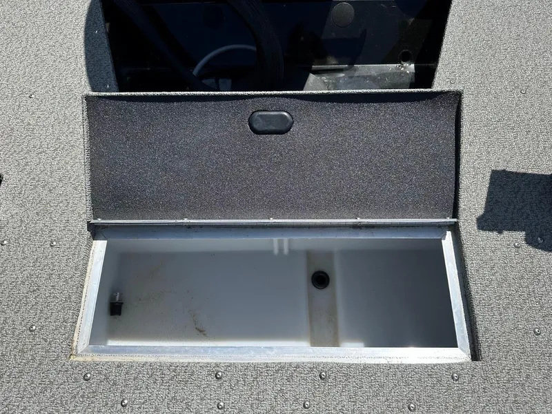 Slide: The Image of Open storage compartment on 2021 Crestliner 1700 Vision boat deck. - 15