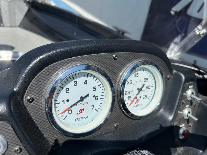 Slide: The Image of Dashboard of 2021 Crestliner 1700 Vision boat with RPM and MPH gauges. - 23