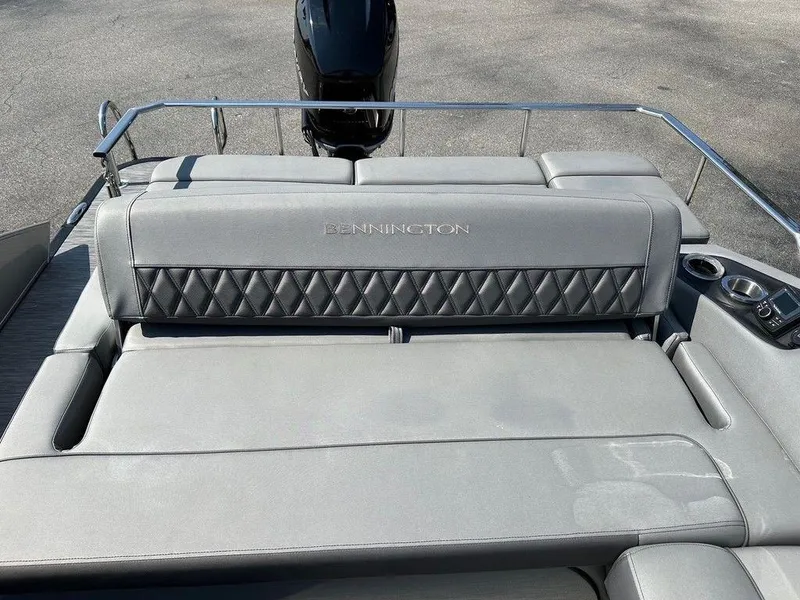 Slide: The Image of 2021 Bennington 25 RXSB boat with luxurious gray seating and diamond stitching. - 10