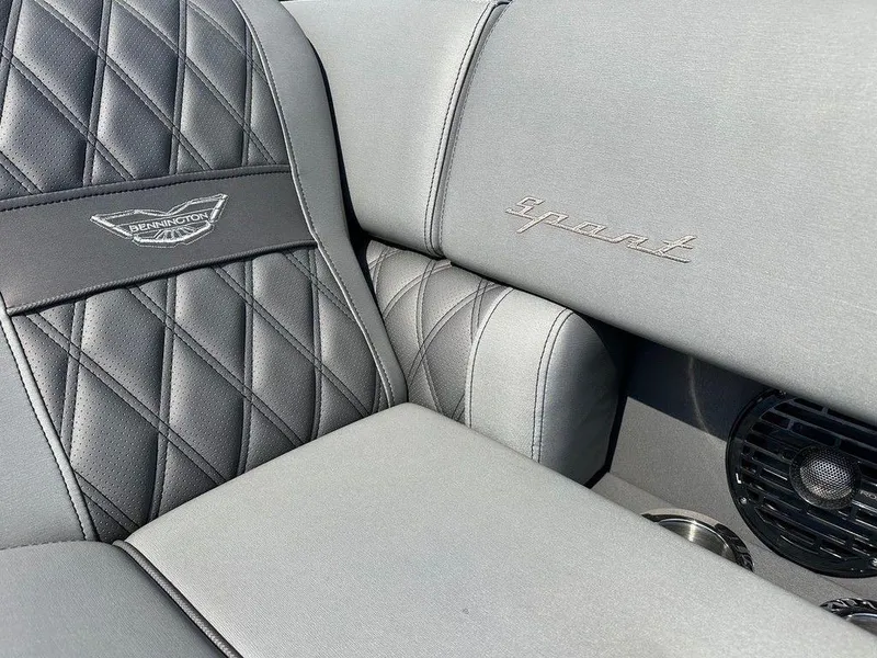 Slide: The Image of Luxurious interior of 2021 Bennington 25 RXSB with quilted seats and elegant embroidery. - 7