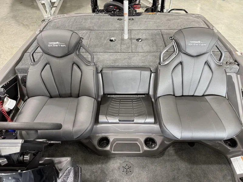 Slide: The Image of 2025 Skeeter ZXR20 boat interior with dual gray seats and storage compartments. - 11
