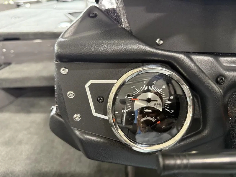 Slide: The Image of Close-up of 2025 Skeeter ZXR20 RPM gauge on dashboard. - 12