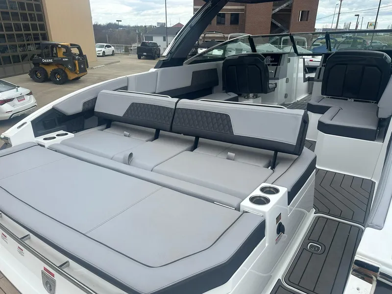 Slide: The Image of 2023 Cobalt R33 boat interior with luxurious seating and modern design. - 18