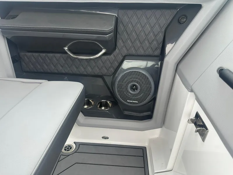 Slide: The Image of Interior of 2023 Cobalt R33 boat with speaker and cup holders. - 20