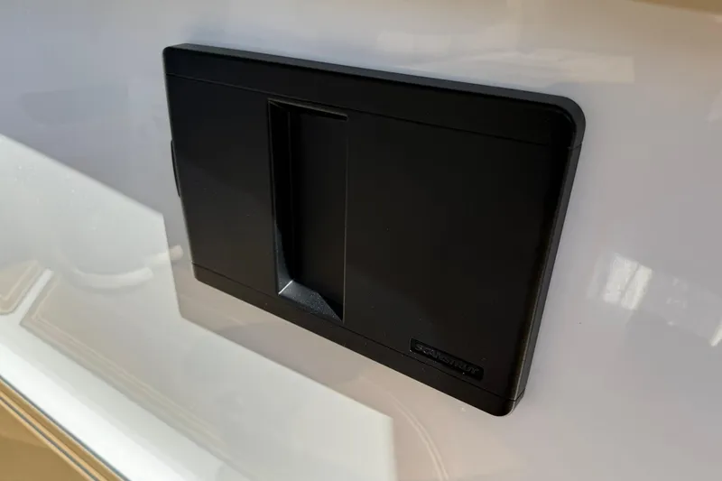 Slide: The Image of Black panel on 2026 Monterey Elite 30 OB boat exterior. - 24