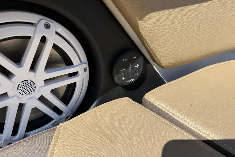 Slide: The Image of Speaker and control panel on 2026 Monterey Elite 30 OB boat interior. - 6