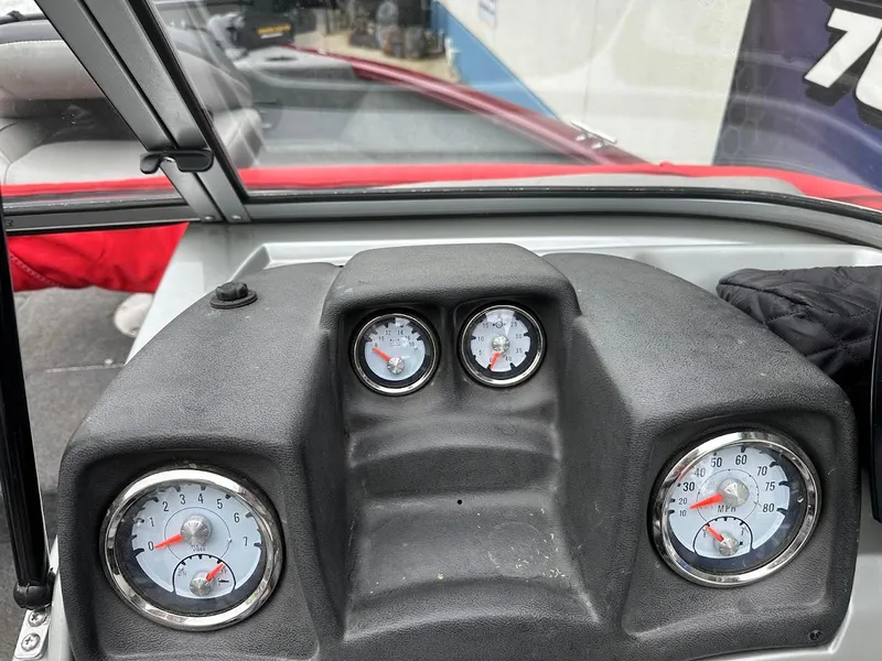 Slide: The Image of Dashboard of 2018 Tracker Pro Guide V-175 Combo boat with gauges. - 16