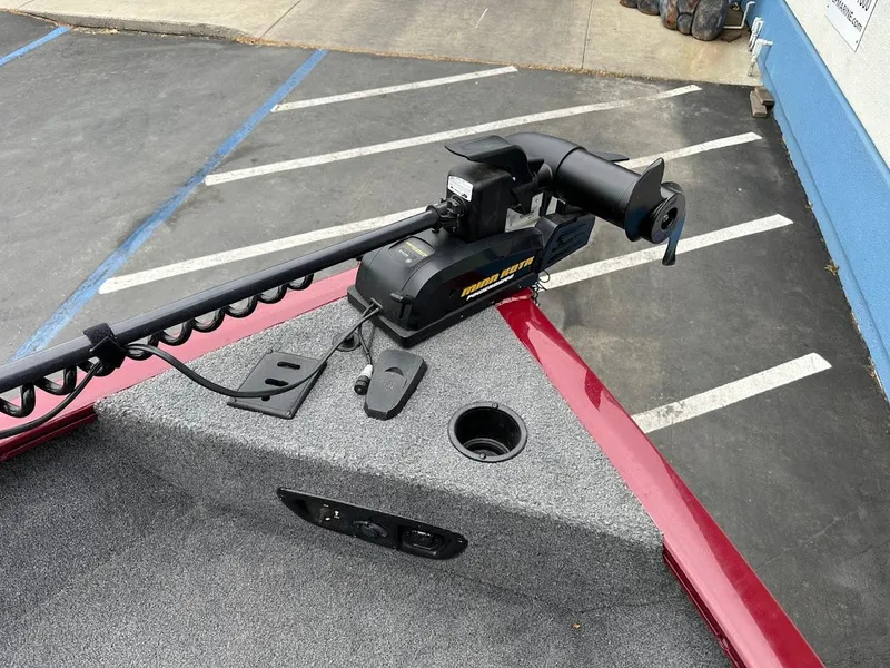 Slide: The Image of 2018 Tracker Pro Guide V-175 Combo boat with trolling motor on carpeted deck. - 20