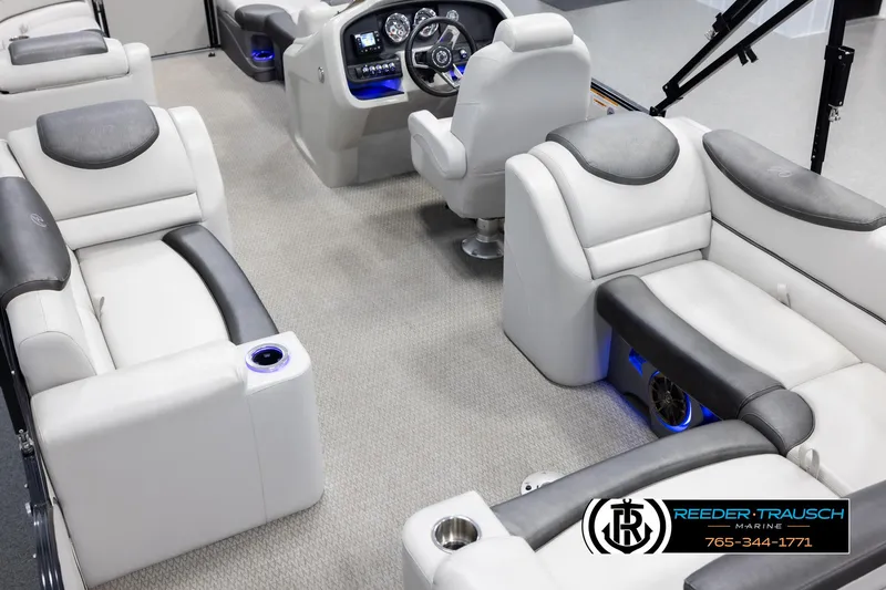 Slide: The Image of Luxurious interior of 2020 Avalon 2385 CAT EL pontoon boat with plush seating and modern dashboard. - 11