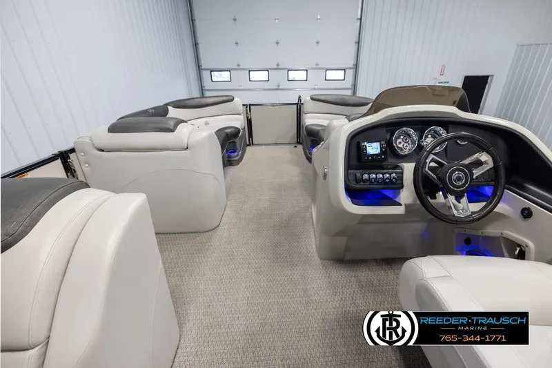 Slide: The Image of Interior of 2020 Avalon 2385 CAT EL pontoon boat with modern dashboard and seating. - 19