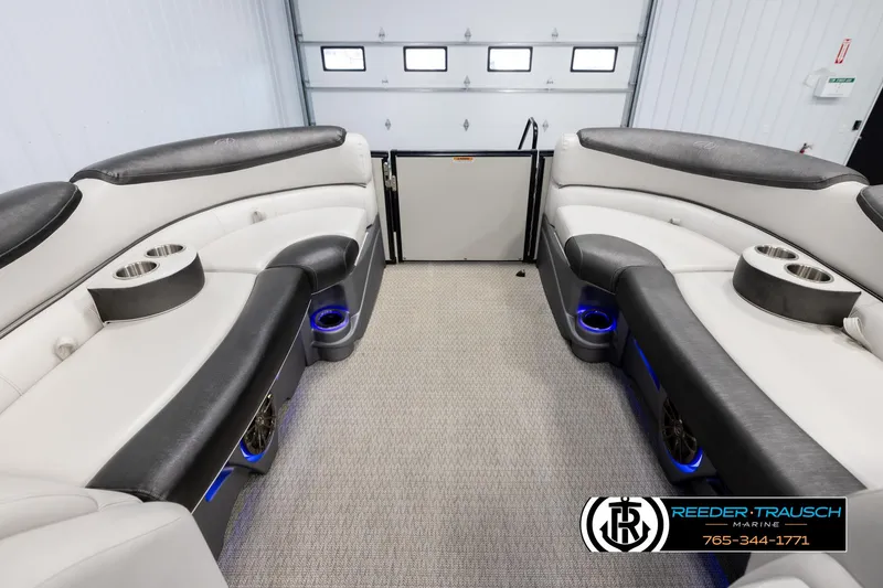Slide: The Image of Luxurious interior of 2020 Avalon 2385 CAT EL pontoon boat with plush seating and cup holders. - 20