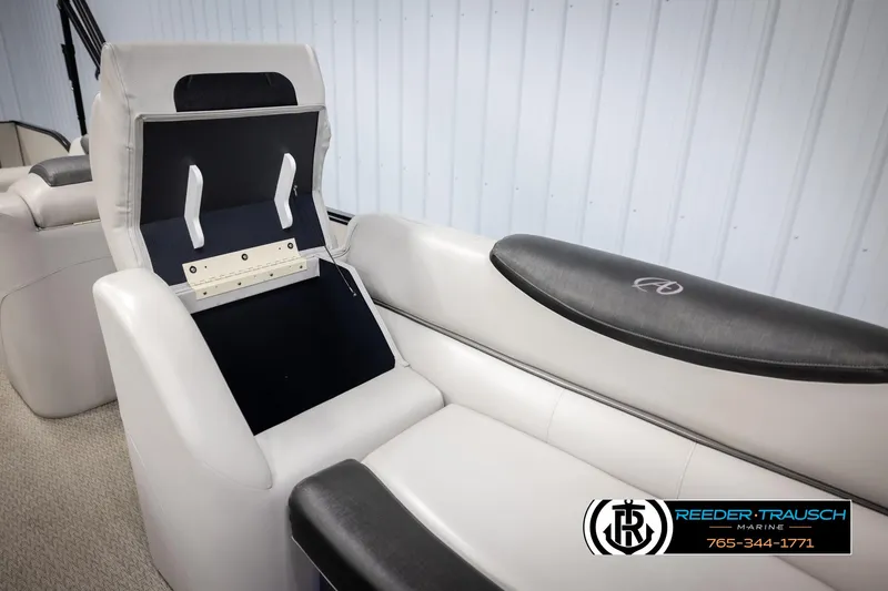 Slide: The Image of Luxurious seating on 2020 Avalon 2385 CAT EL boat, featuring sleek design and storage. - 23
