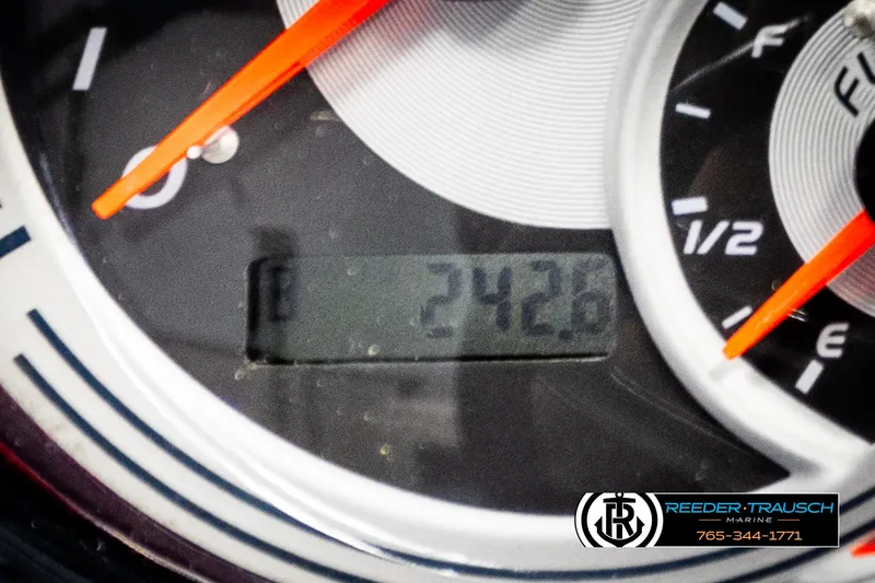 Slide: The Image of Close-up of Avalon 2385 CAT EL 2020 dashboard gauge, showing 242.8 hours. - 30