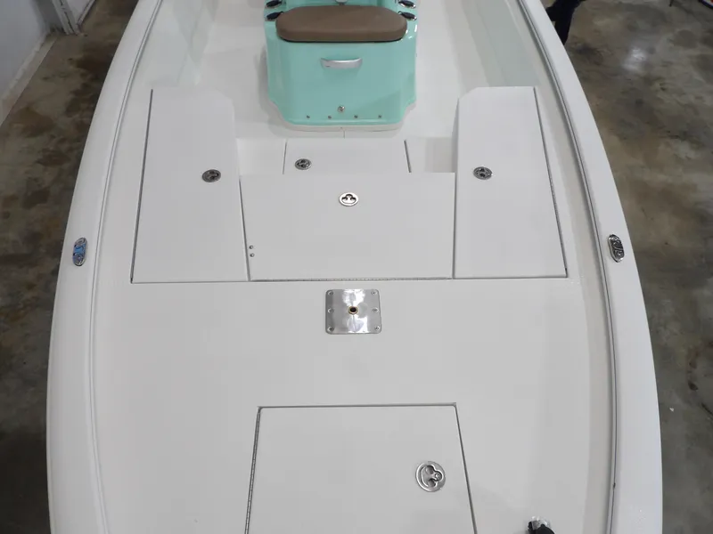 Slide: The Image of Avid 21FST 2025 boat deck with storage compartments and seating. - 12