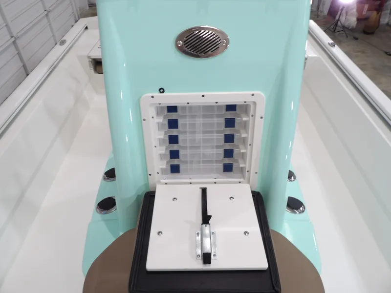 Slide: The Image of Avid 21FST 2025 boat console with storage compartments, mint green finish. - 14