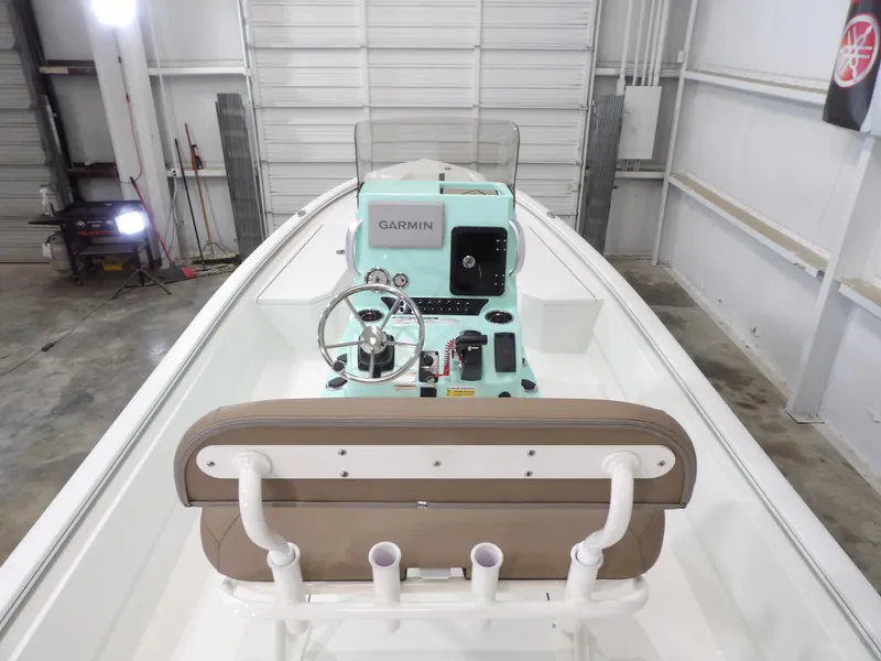 Slide: The Image of Interior view of 2025 Avid 21FST boat with Garmin navigation system. - 21