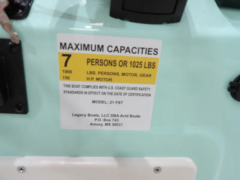 Slide: The Image of 2025 Avid 21FST boat capacity label: 7 persons or 1025 lbs, 150 HP motor. - 22