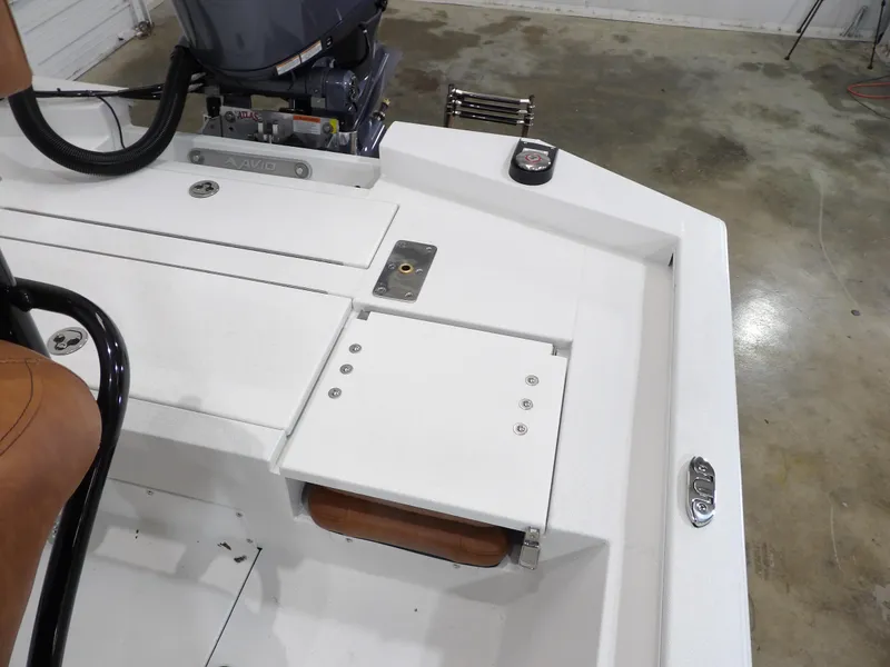 Slide: The Image of 2025 Avid 21FST boat interior with motor and seating, showcasing sleek design and functionality. - 20