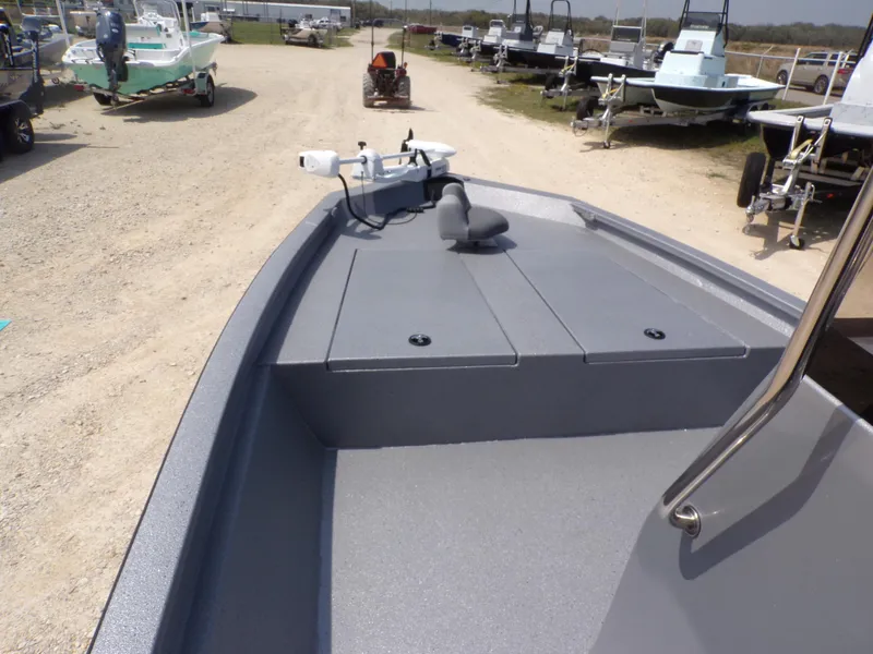 Slide: The Image of 2025 Xpress H210BAY boat on display, featuring a sleek deck design. - 14