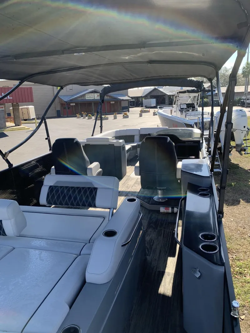 Slide: The Image of 2023 Godfrey San Pan 2700 DFLC pontoon boat with spacious seating and canopy. - 3
