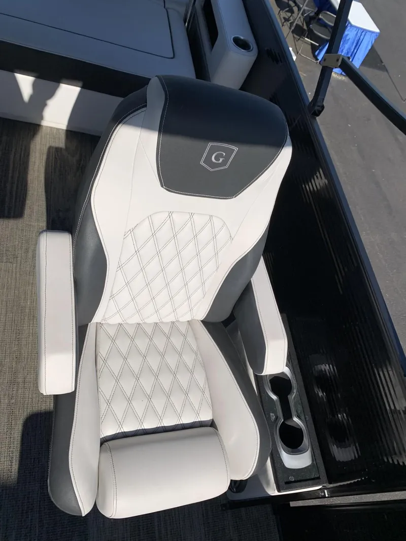 Slide: The Image of Luxurious 2023 Godfrey San Pan 2700 DFLC boat seat with diamond stitching and cup holder. - 7