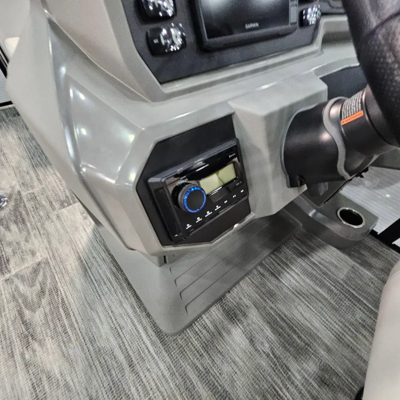 Slide: The Image of 2025 Qwest E 18 RLS dashboard with modern controls and steering wheel detail. - 11