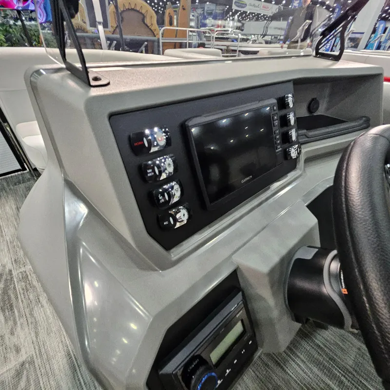Slide: The Image of Dashboard of 2025 Qwest E 18 RLS boat with modern controls and display. - 12