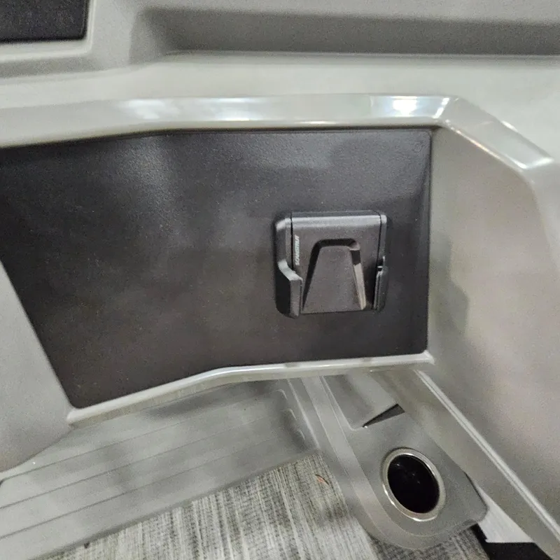 Slide: The Image of Interior detail of 2025 Qwest E 18 RLS, featuring a sleek black panel and latch. - 14